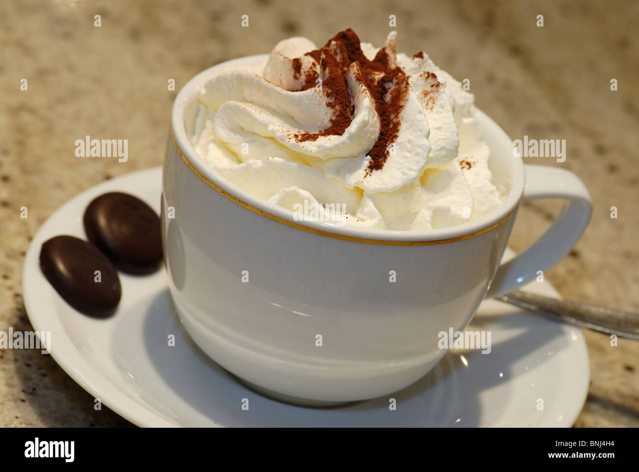 cup of cappuccino with cream Stock Photo
