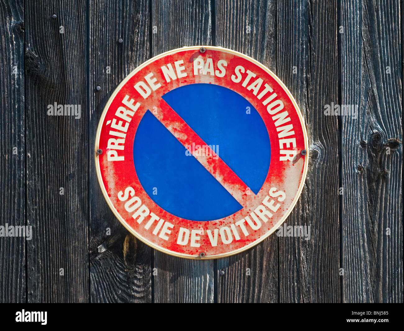 French no parking / way out for cars warning sign. Stock Photo