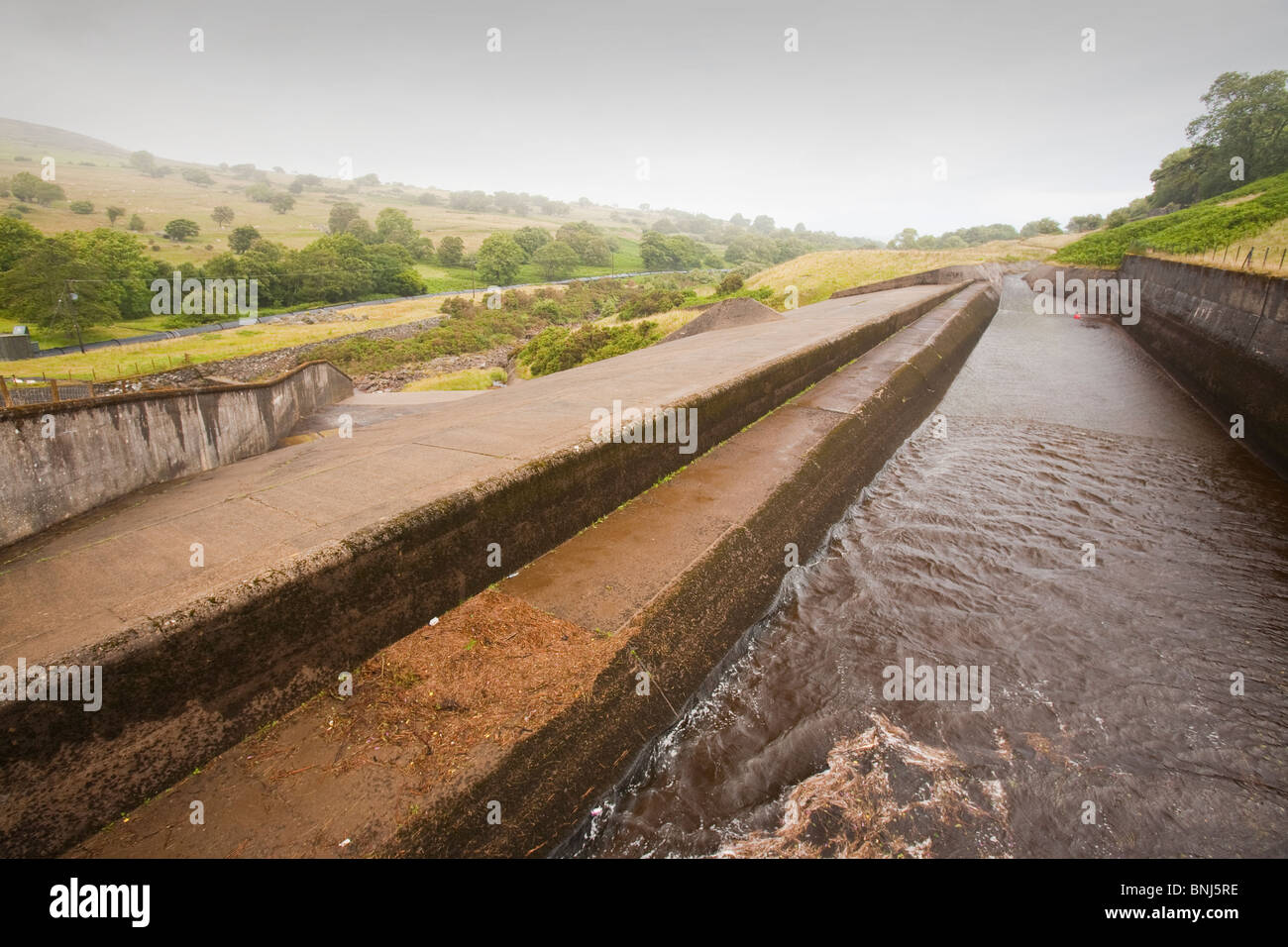 The overspill from Coedty reservoir which supplies water to the Dolgarrog hydro power station in Snowdonia, North Wales, Stock Photo