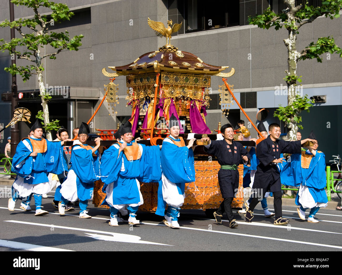 Japan Asia Tokyo town city Kanda Miyojin festival Mikoshi relocation move custom costumes Stock Photo