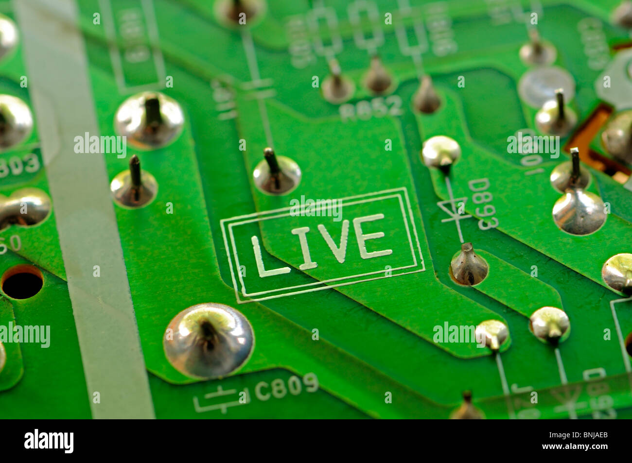 Detail of printed circuit board from a television. 'Live' Stock Photo