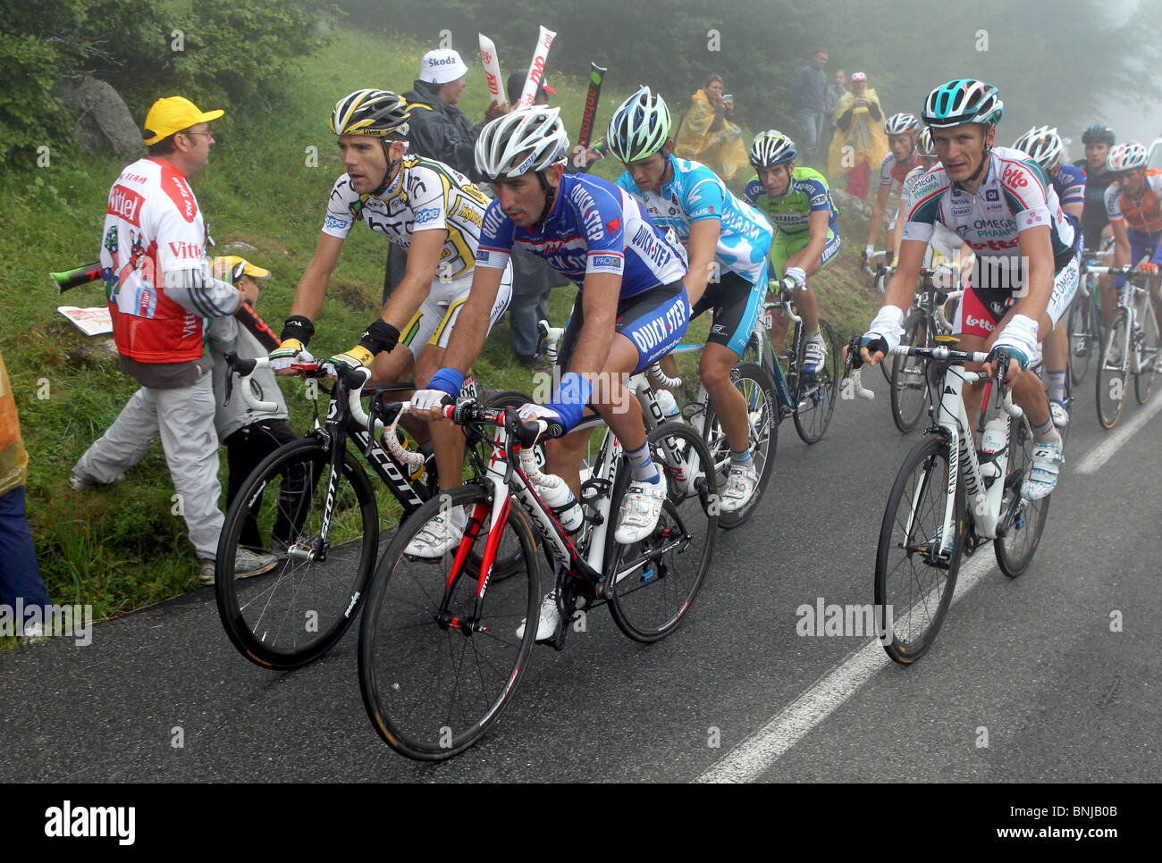 Cyclists competing in stage 17 of the 2010 Tour de France on the Col du Tourmalet in French Pyrenees, France Stock Photo