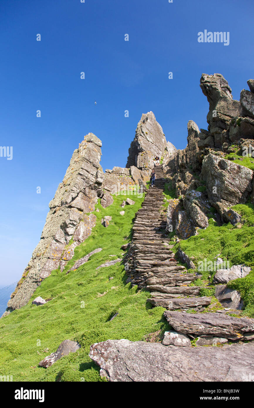 Ancient steps leading to celtic monastic monastery Skellig Michael looking to Little Skellig County Co. Kerry Ireland Stock Photo