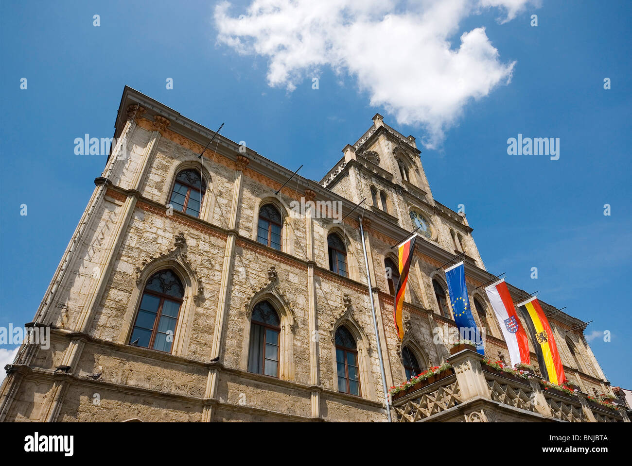 Germany Thuringia Weimar city hall Marktplatz flags dynamically balcony