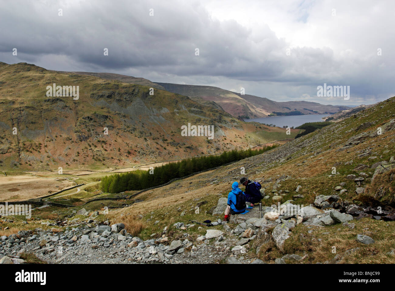 Walkers taking a rest near Haweswater, Mardale in the Lake District