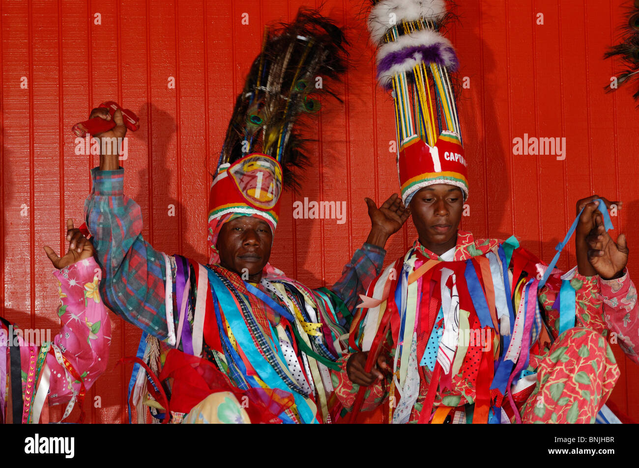 Masqueraders at Royal St. Kitts Hotel & Casino Frigate Bay Saint Kitts Caribbean group performing musicians musician men man Stock Photo
