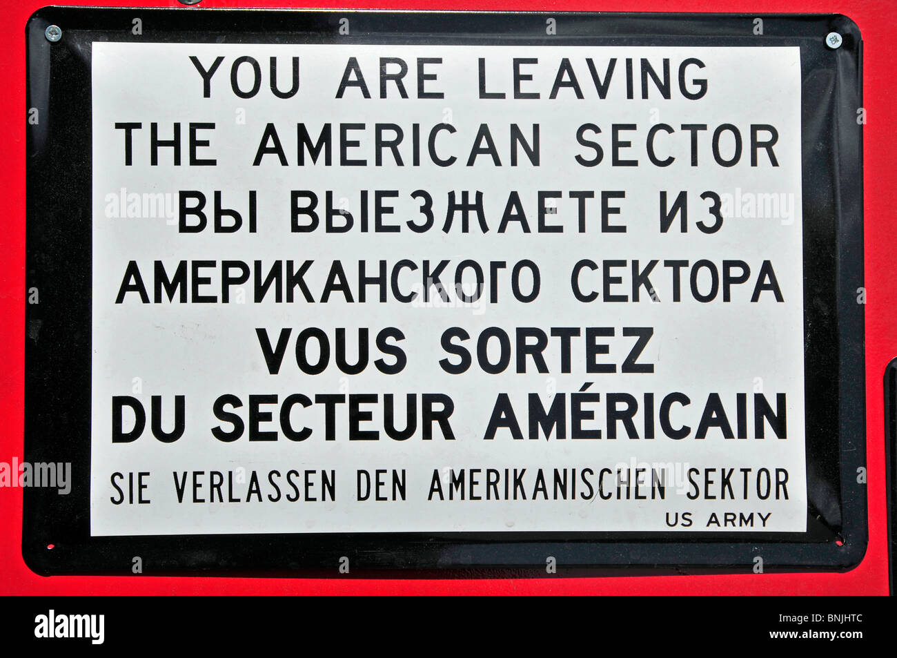 Berlin checkpoint Charlie German history story Germany former Europe Friedrichstrasse border capital internally sign shield Stock Photo