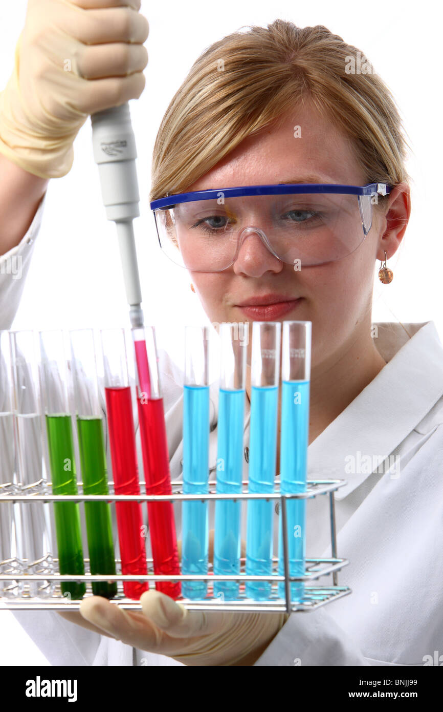 Laboratory assistant working in  a chemical laboratory. Working with different chemicals in test tubes. Stock Photo