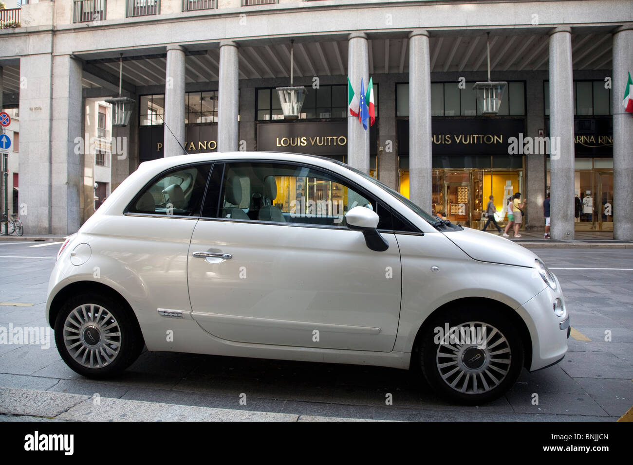 Fiat 500 car outside Louis Vuitton Shop in Via Roma Street in Turin, Italy  Stock Photo - Alamy