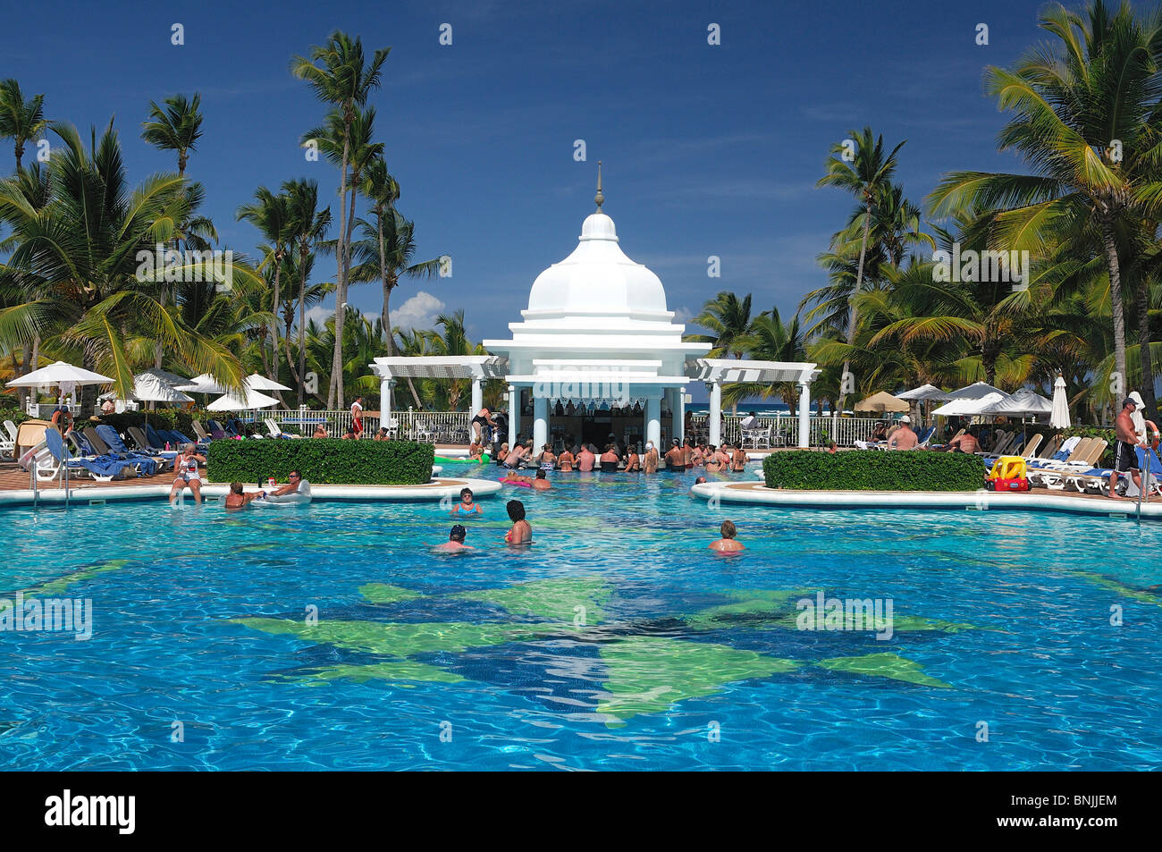 Pool Riu Palace Punta Cana Hotel Punta Cana Dominican Republic swimming pool travel tourism holiday Caribbean Stock Photo