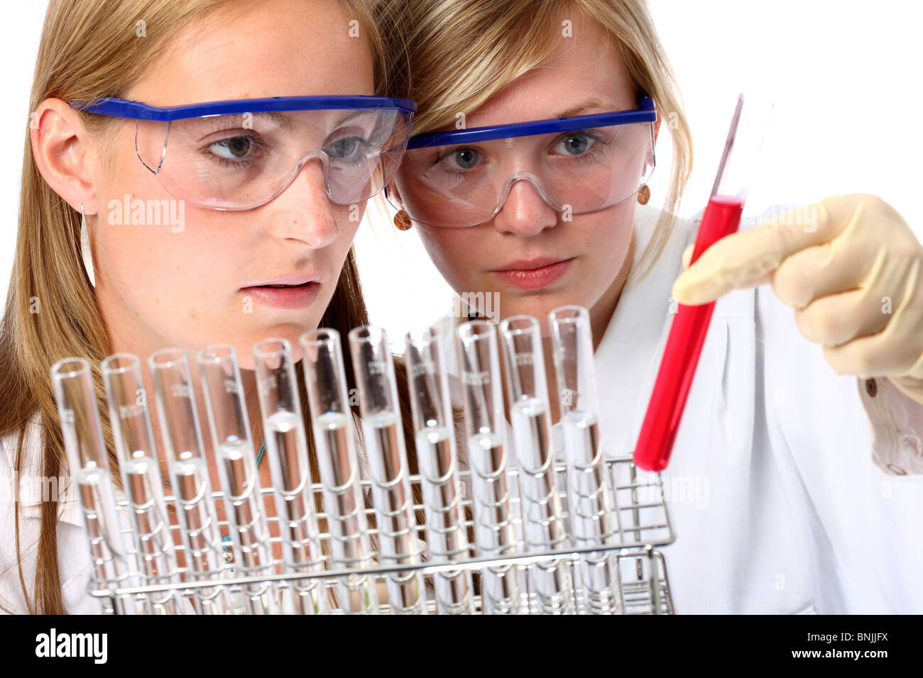 Lab Helpers Laboratory assistants working in a chemical laboratory. Working with ...