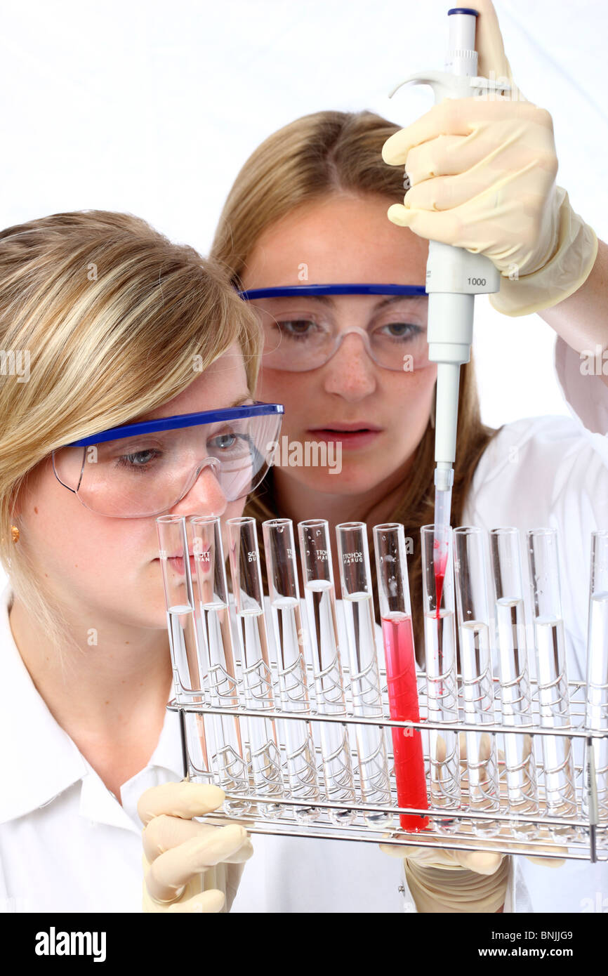 Laboratory assistants working in a chemical laboratory. Working with different chemicals in test