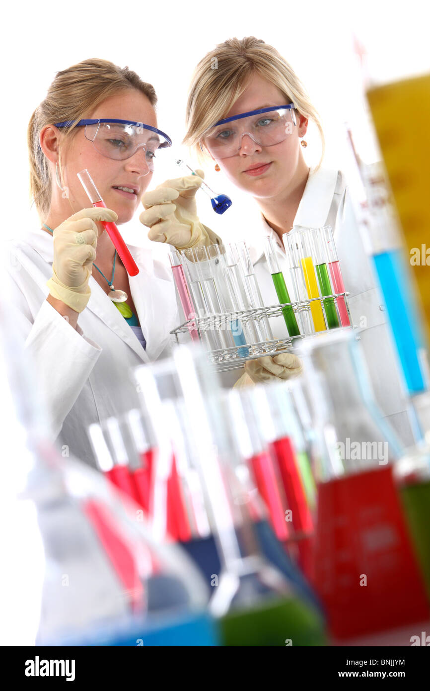 Laboratory assistants working in a chemical laboratory. Working with