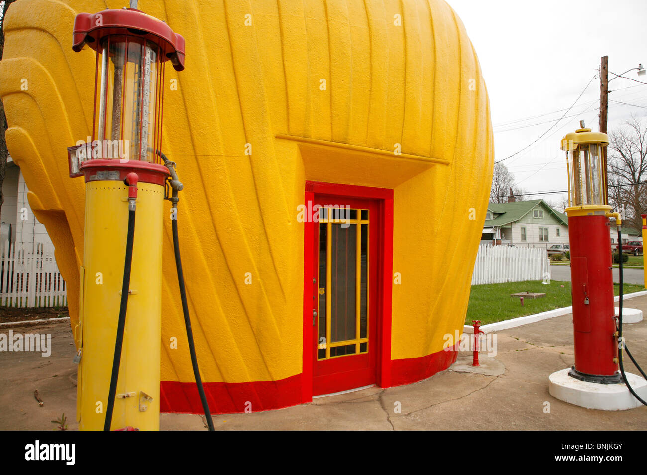 Old Historic landmark Shell Gas Station and globe pumps in Winston Salem North Carolina Stock Photo