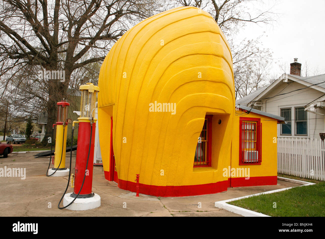 Old Historic landmark Shell Gas Station and globe pumps in Winston