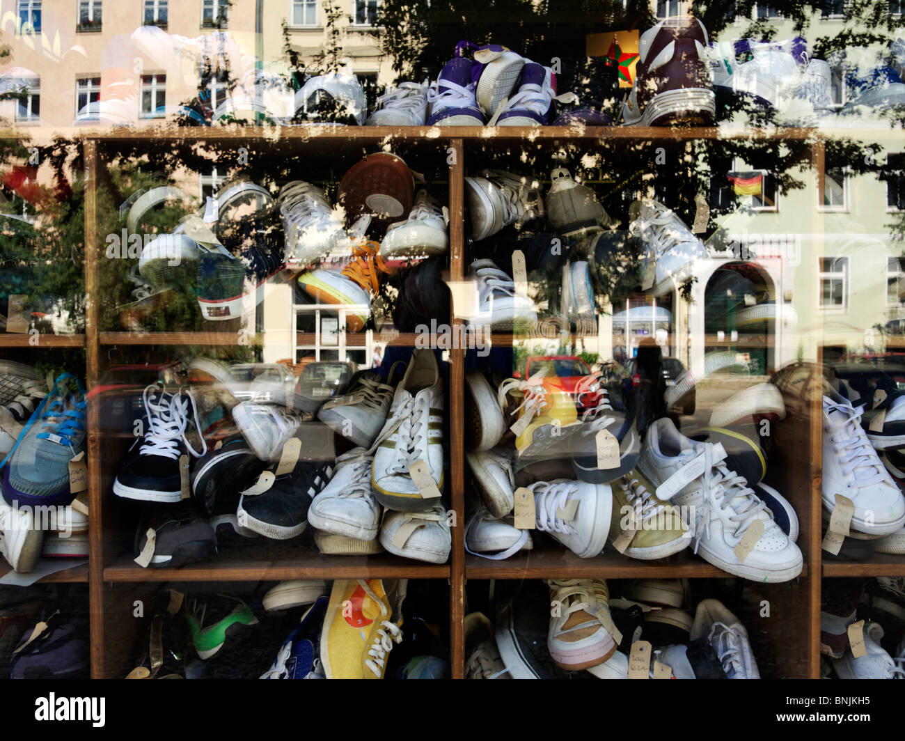 Sneakers inside a shop window in Berlin, Germany Stock Photo - Alamy