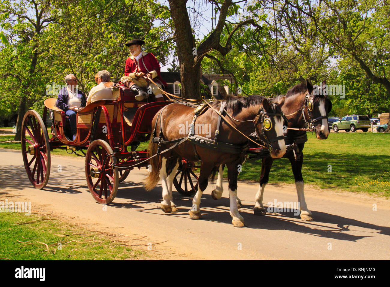 Tourist take carriage ride through the Historic Area in Colonial