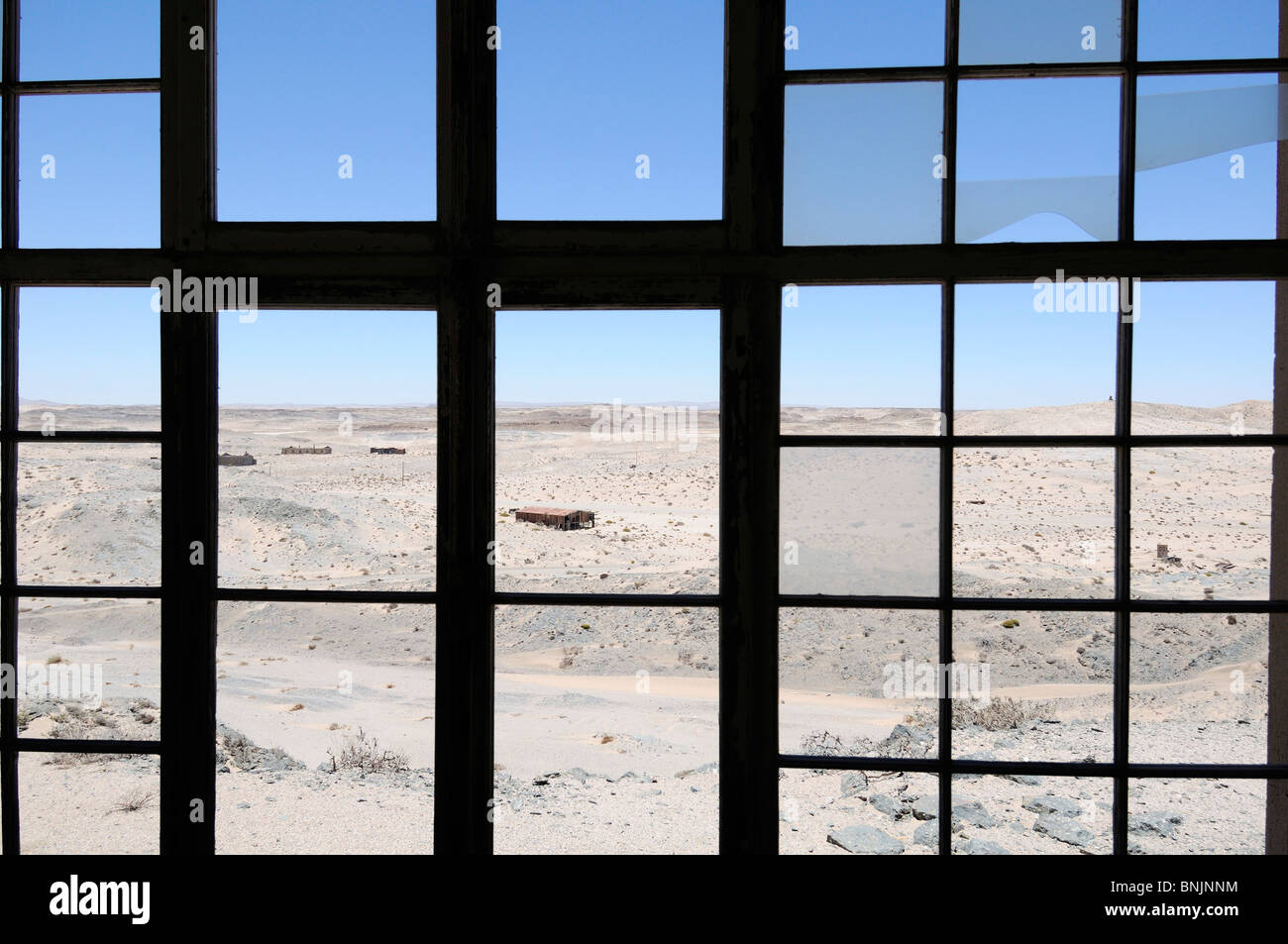 Old mining buildings Sperrgebiet Prohibited Area Diamond Area 1 Luderitz Karas Region Namibia Africa Travel Nature window Stock Photo