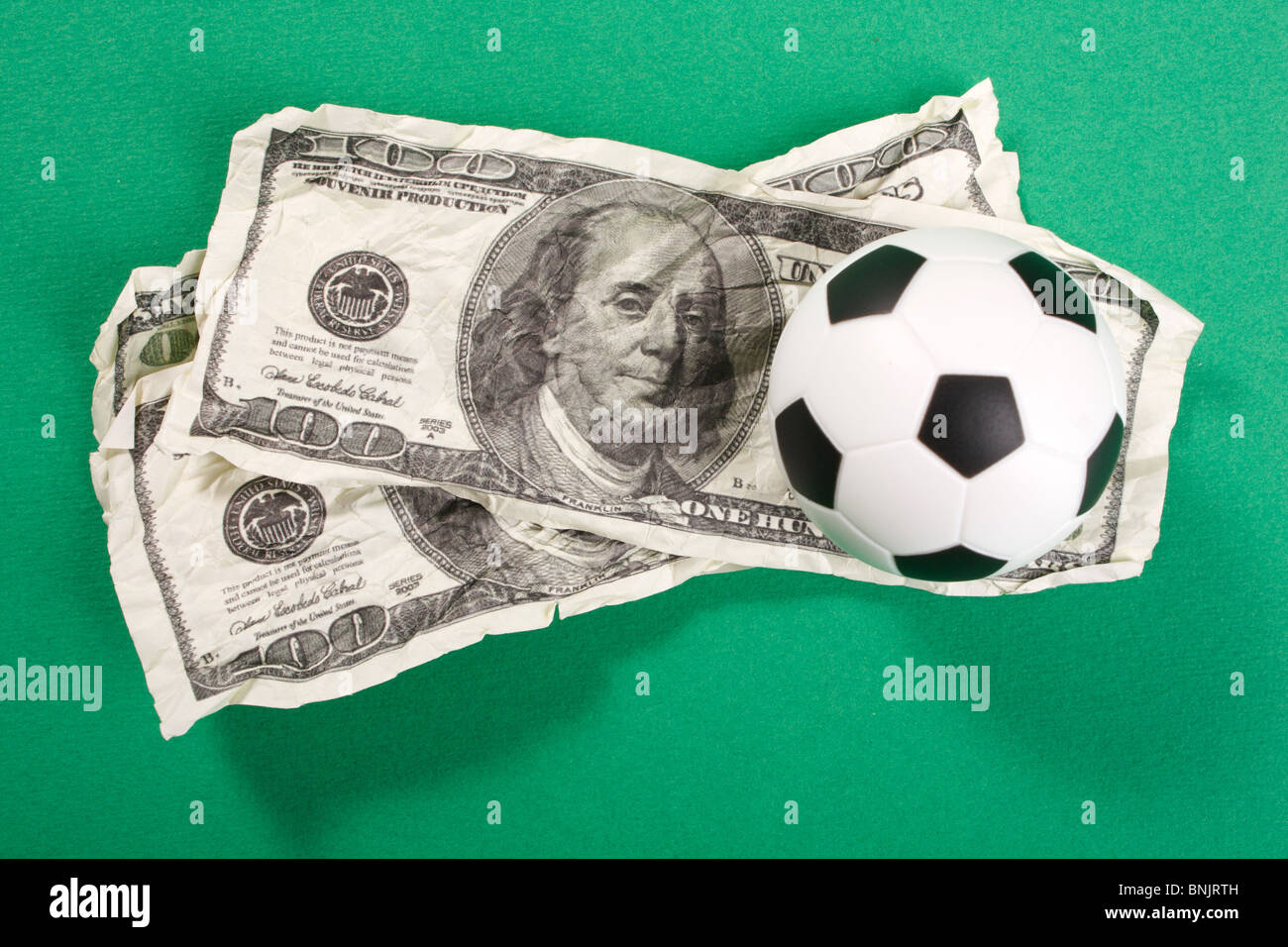 football on a dollar bank note Stock Photo Alamy