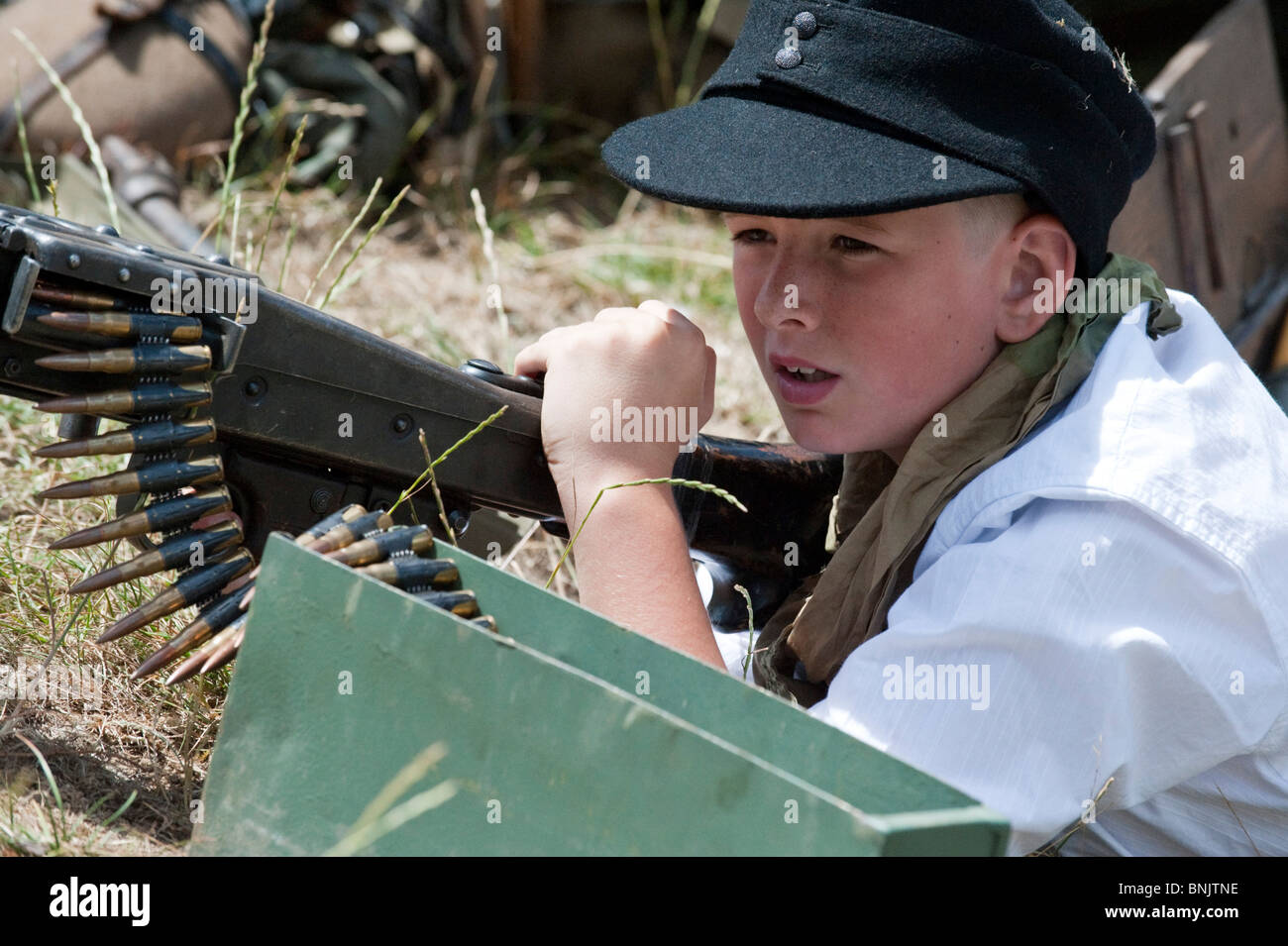 Visitors, young and old wander through the War and Peace Show, the World's Largest Military Spectacular Stock Photo