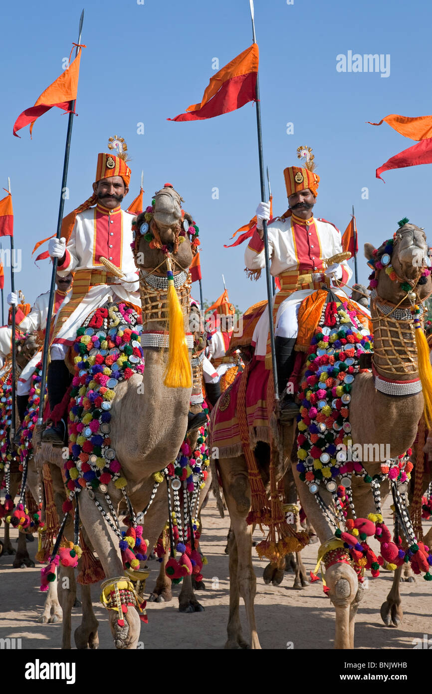 Indian soldiers riding camels. Jaisalmer Festival. Rajasthan. India ...