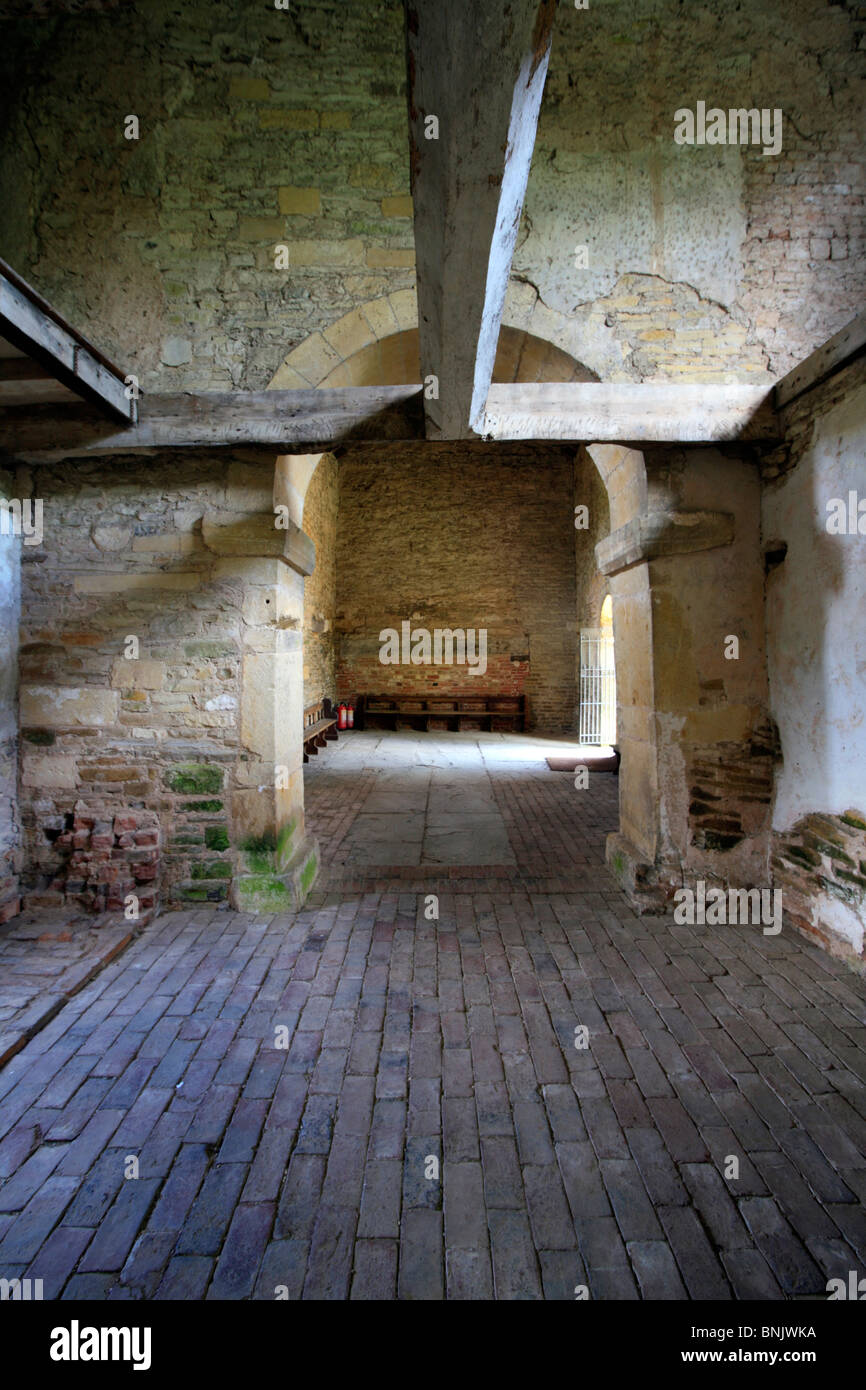 Internal view of Odda's Chapel showing typical Saxon arch, Deerhurst, Gloucestershire, England Stock Photo