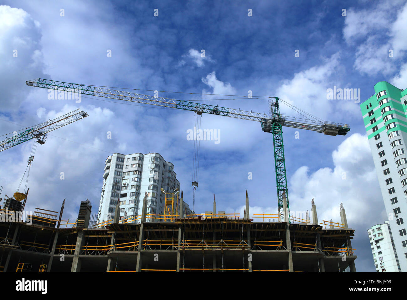 construction of modern skyscrapers and building crane Stock Photo