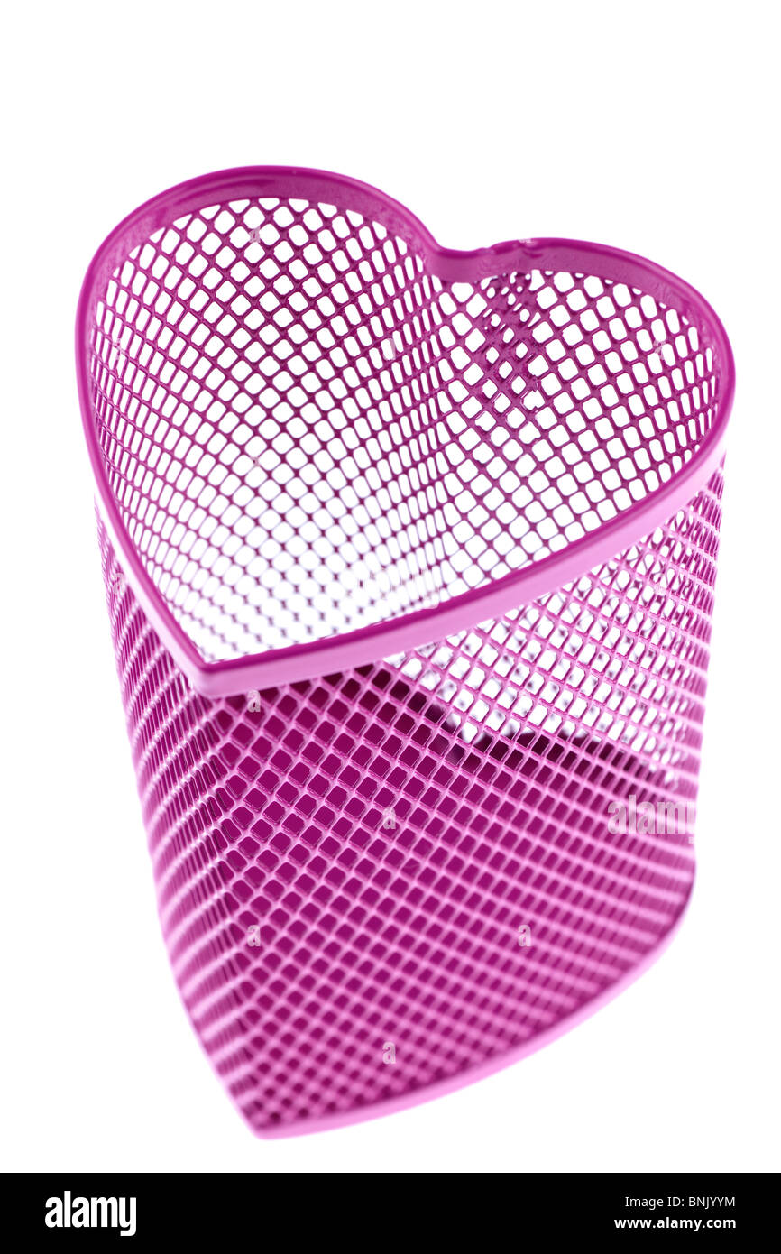 Heart shaped metal mesh pink pencil holder Stock Photo - Alamy
