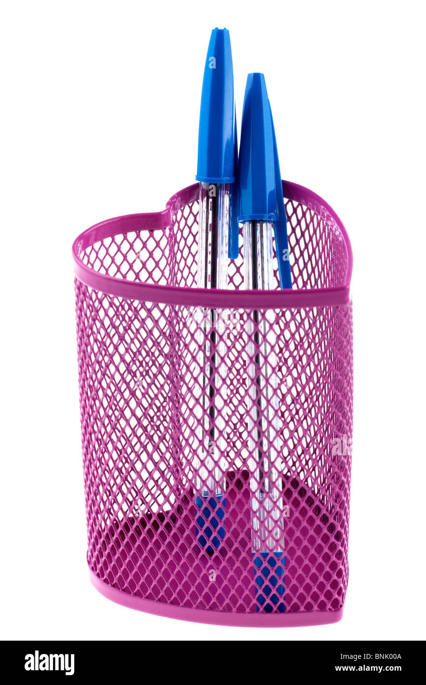 Heart shaped metal mesh pink pencil holder Stock Photo - Alamy