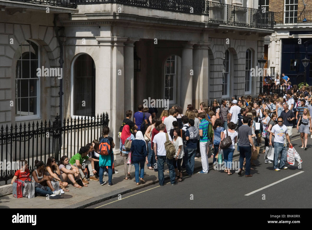 Abercrombie & Fitch Burlington Gardens London lifestyle clothing store.  Shoppers queue to enter the store. 2010s HOMER SYKES Stock Photo - Alamy