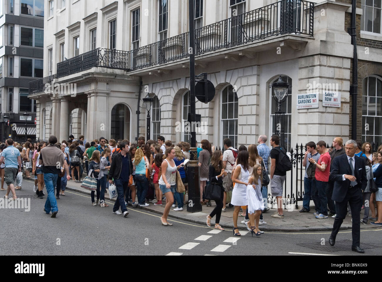 Abercrombie & Fitch London UK lifestyle clothing store. Shoppers queue to enter Mayfair store. HOMER SYKES Stock Photo