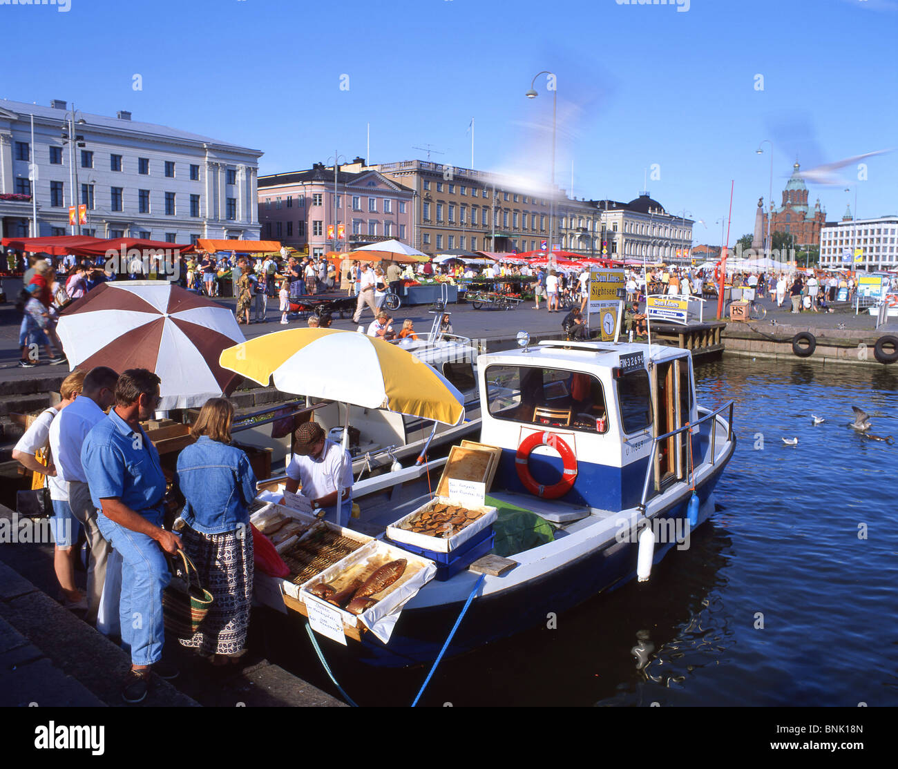 Selling fish from boat in harbour, Kauppatori Market Square, Helsinki, Uusimaa Region, Republic of Finland Stock Photo