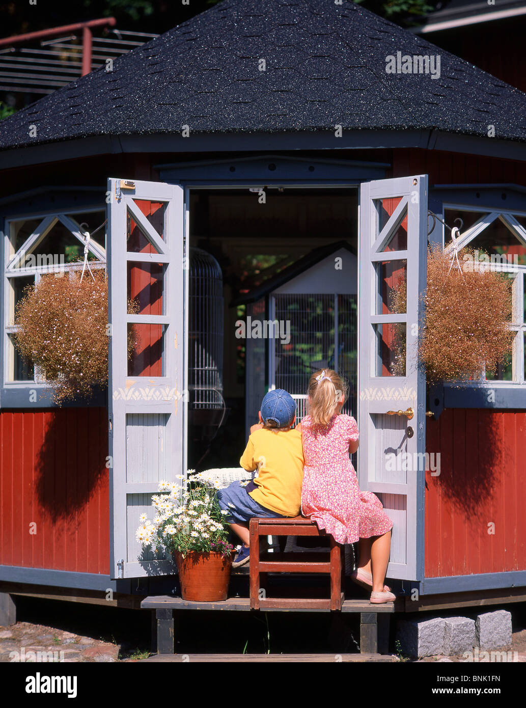 Children in summer house, Old Town, Porvoo, Uusimaa Region, Republic of Finland Stock Photo