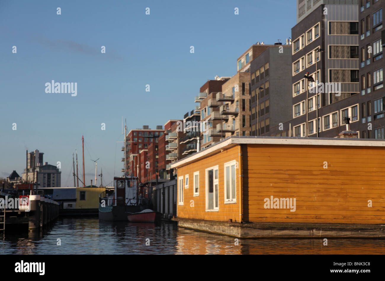 Canal and house boats in Amsterdam Stock Photo