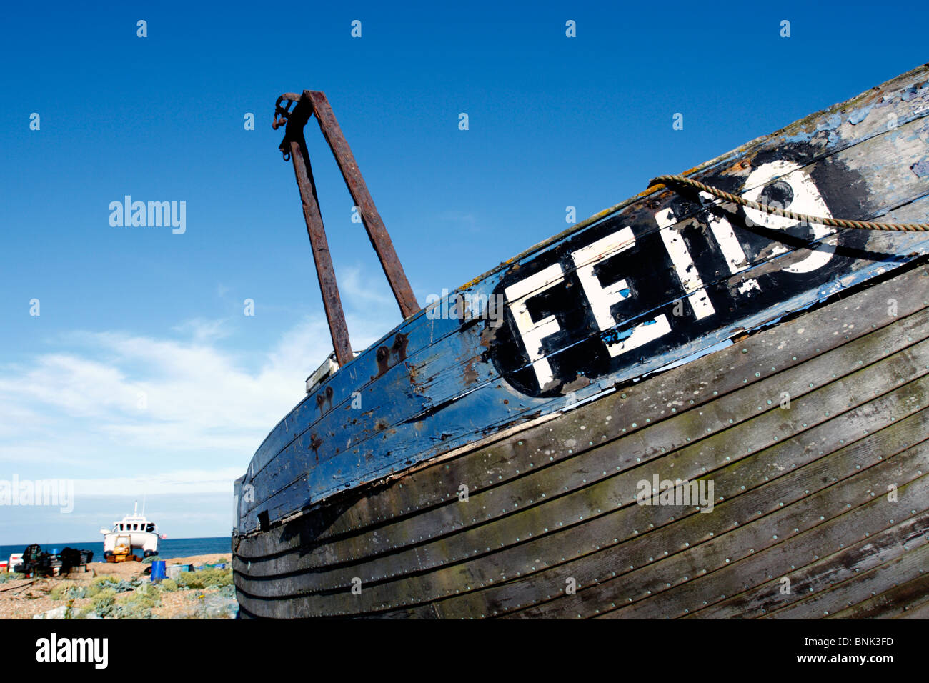 Old fishing boat on shingle beach, Dungeness, Kent Stock Photo - Alamy