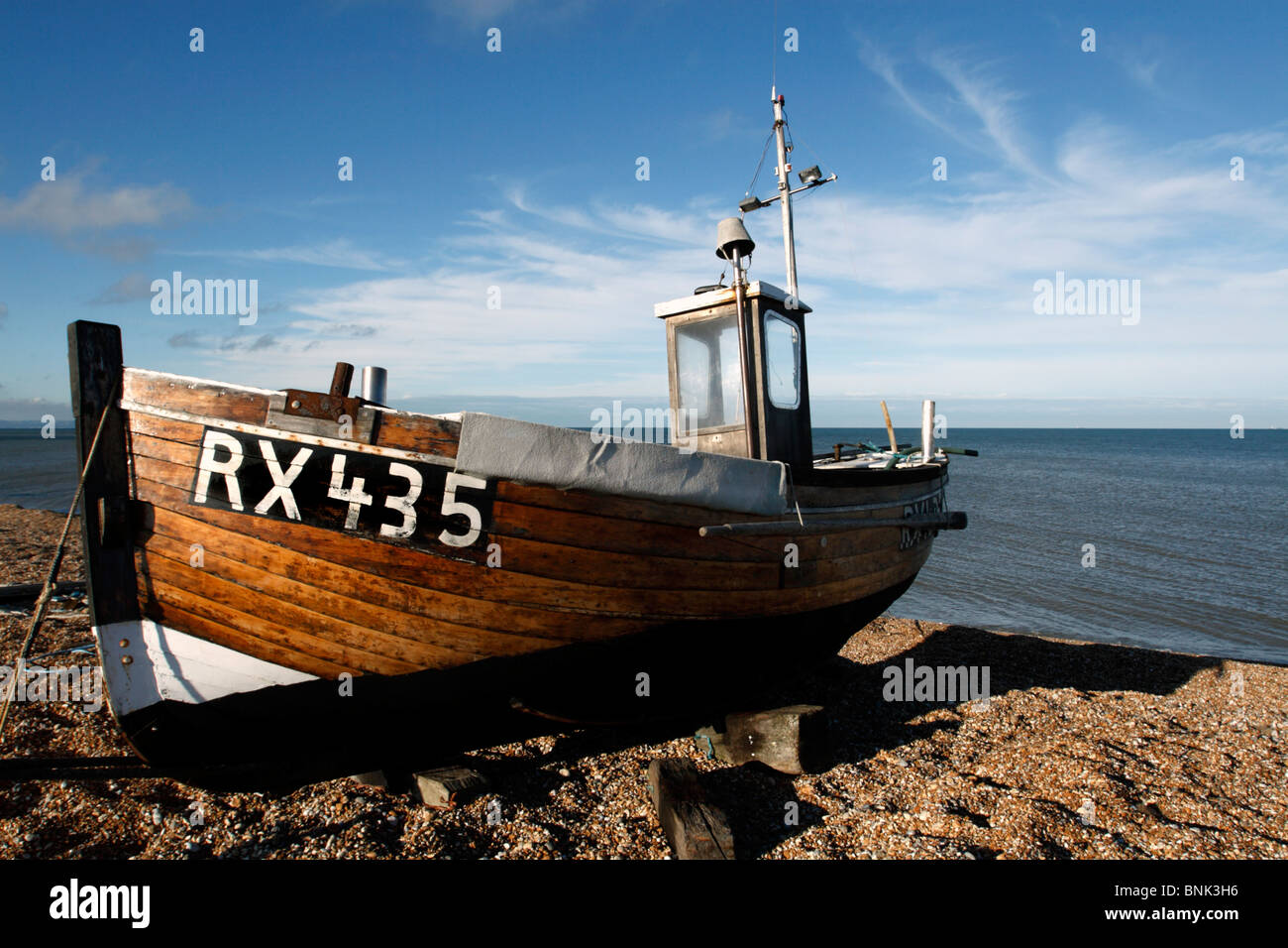 Fishing boat on shingle beach, Dungeness, Kent Stock Photo - Alamy