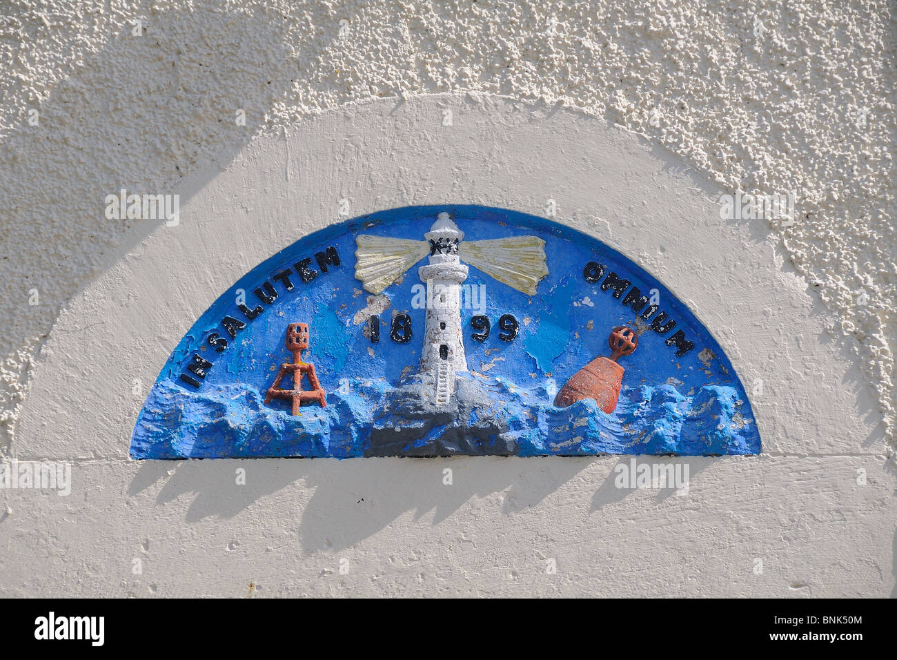 Northern Lighthouse Board motto 'In Salutem Omnium' (For the safety of all), Flannan Islands shore station, Breasclete, Lewis Stock Photo
