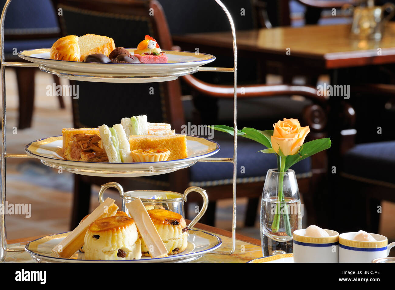 Traditional Afternoon tea in the lobby The Peninsula Hotel Hong Kong 5 star luxury hotel Afternoon tea Stock Photo