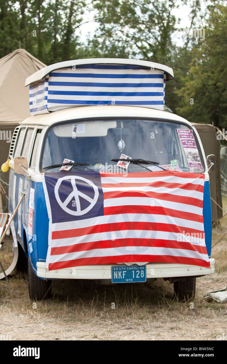 VW Camper Van rigged out as a Protest Vehicle against the Vietnam War during a Reenactment weekend Stock Photo