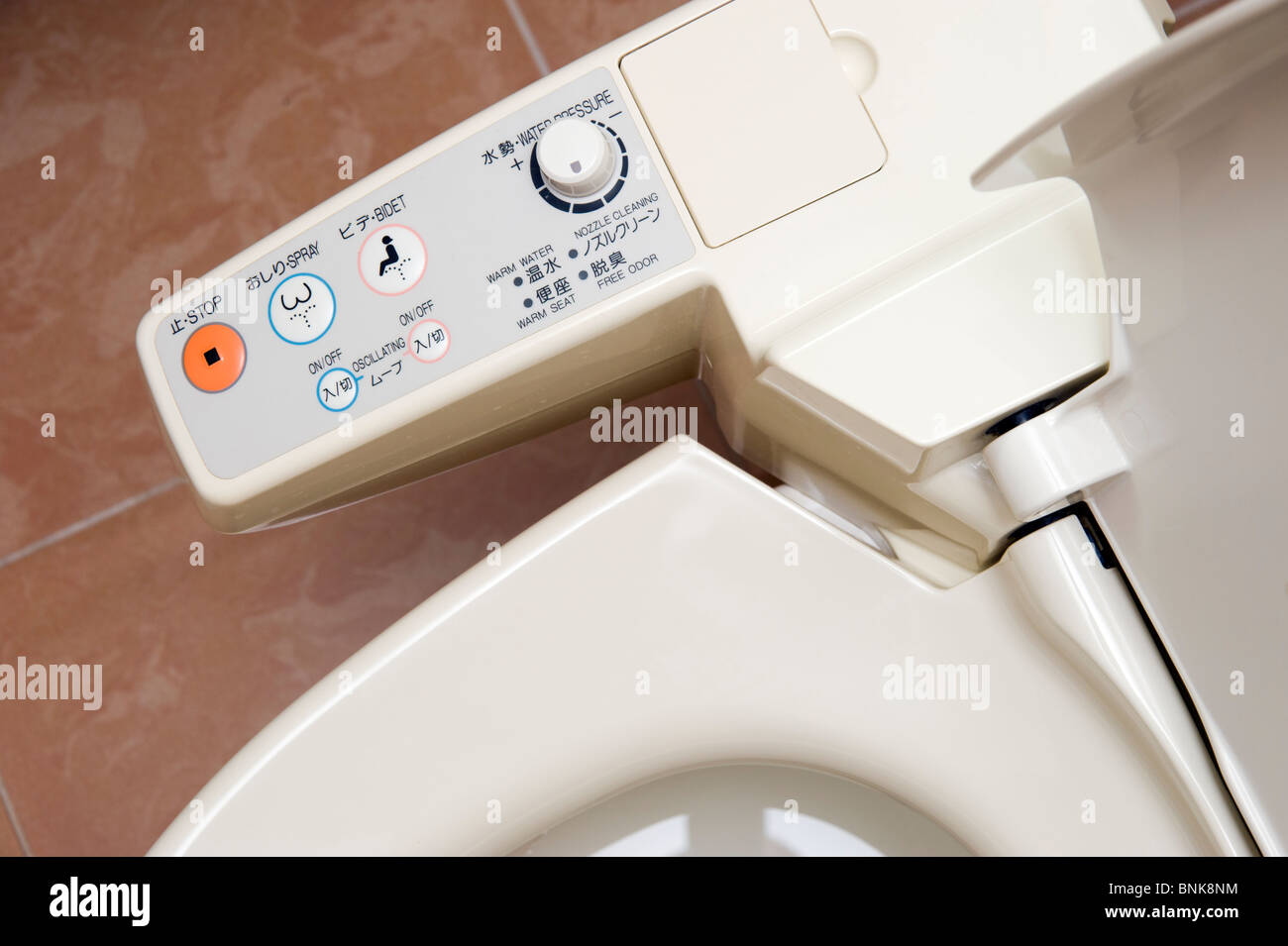 Buttons on a high tech bidet toilet, Tokyo, Japan Stock Photo