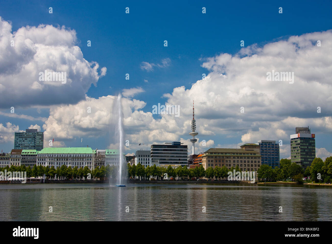 Germany Hamburg town city the Alster water fountain television tower traveling tourism holidays vacation Stock Photo