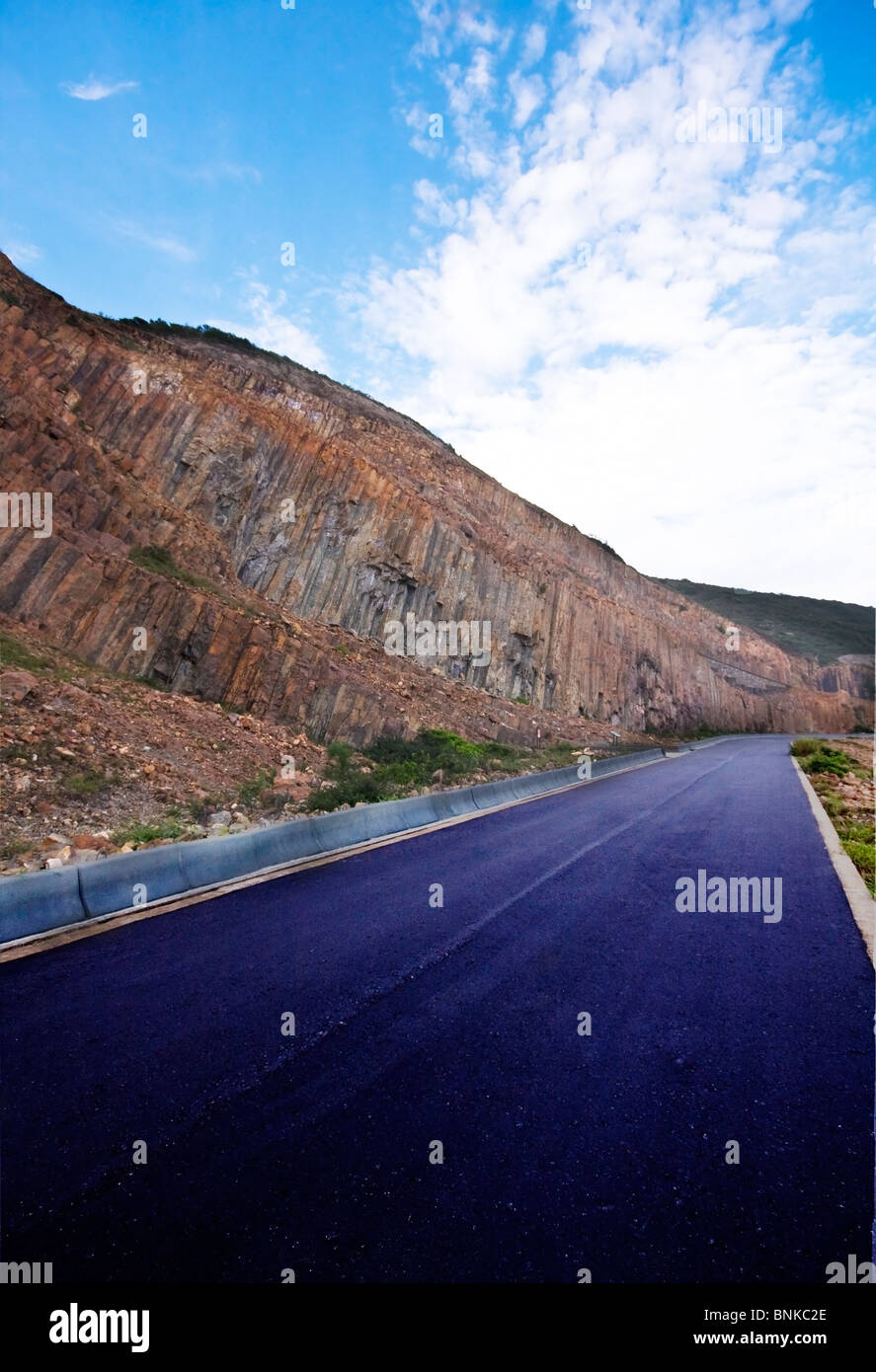 Asphalt road blue sky with clouds and mountains Stock Photo - Alamy