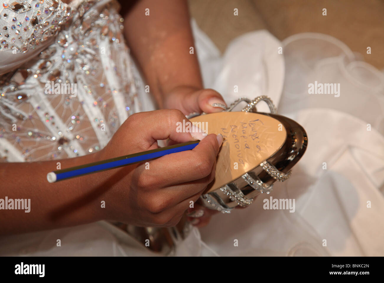 Jimmy Choo white wedding shoes for a bride Stock Photo - Alamy