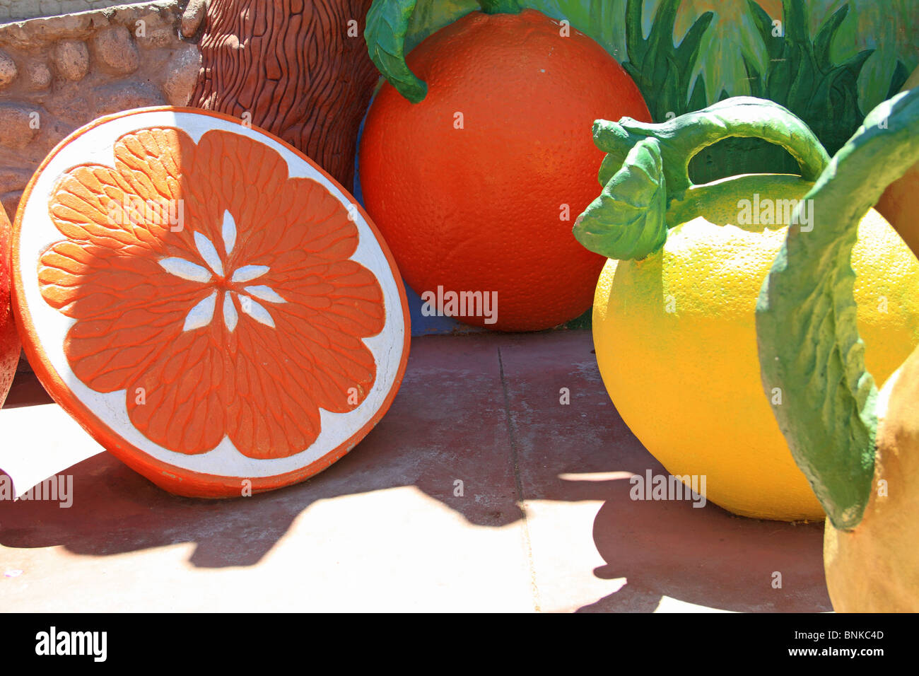 Large fruit sculptures, outside the hot springs at Pica, Atacama Desert, northern Chile Stock Photo