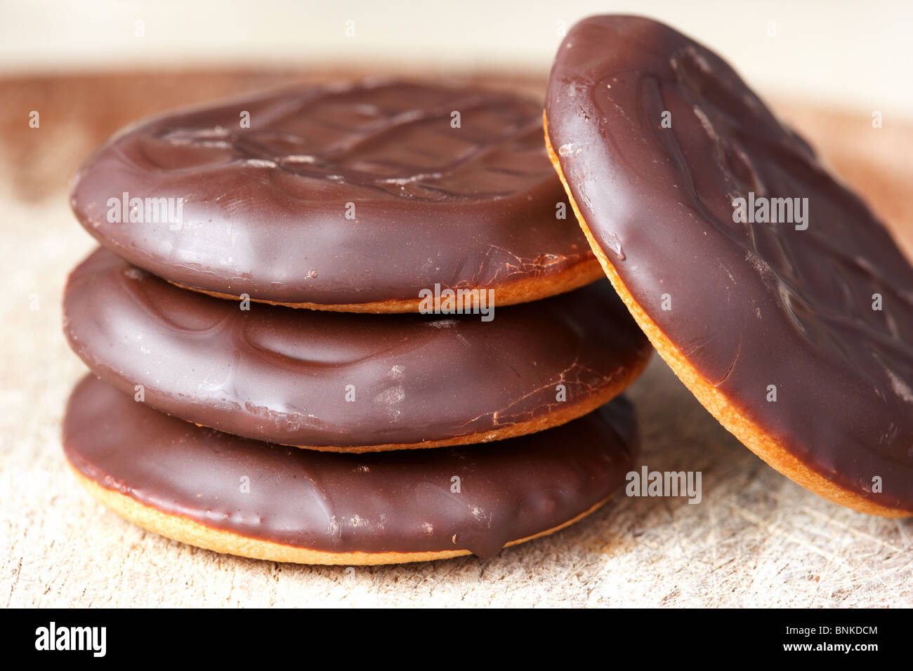 pile of chocolate covered cheap shops own brand jaffa cakes style jaffa cake Stock Photo