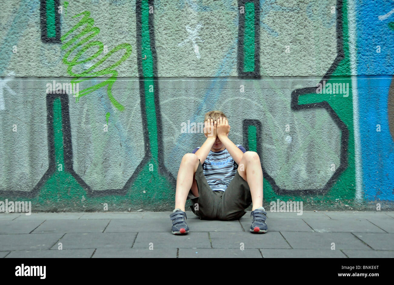 Europe Germany North Rhine-Westphalia Cologne person person child boy boy manly frustrates sadly unhappily unluckily is Stock Photo