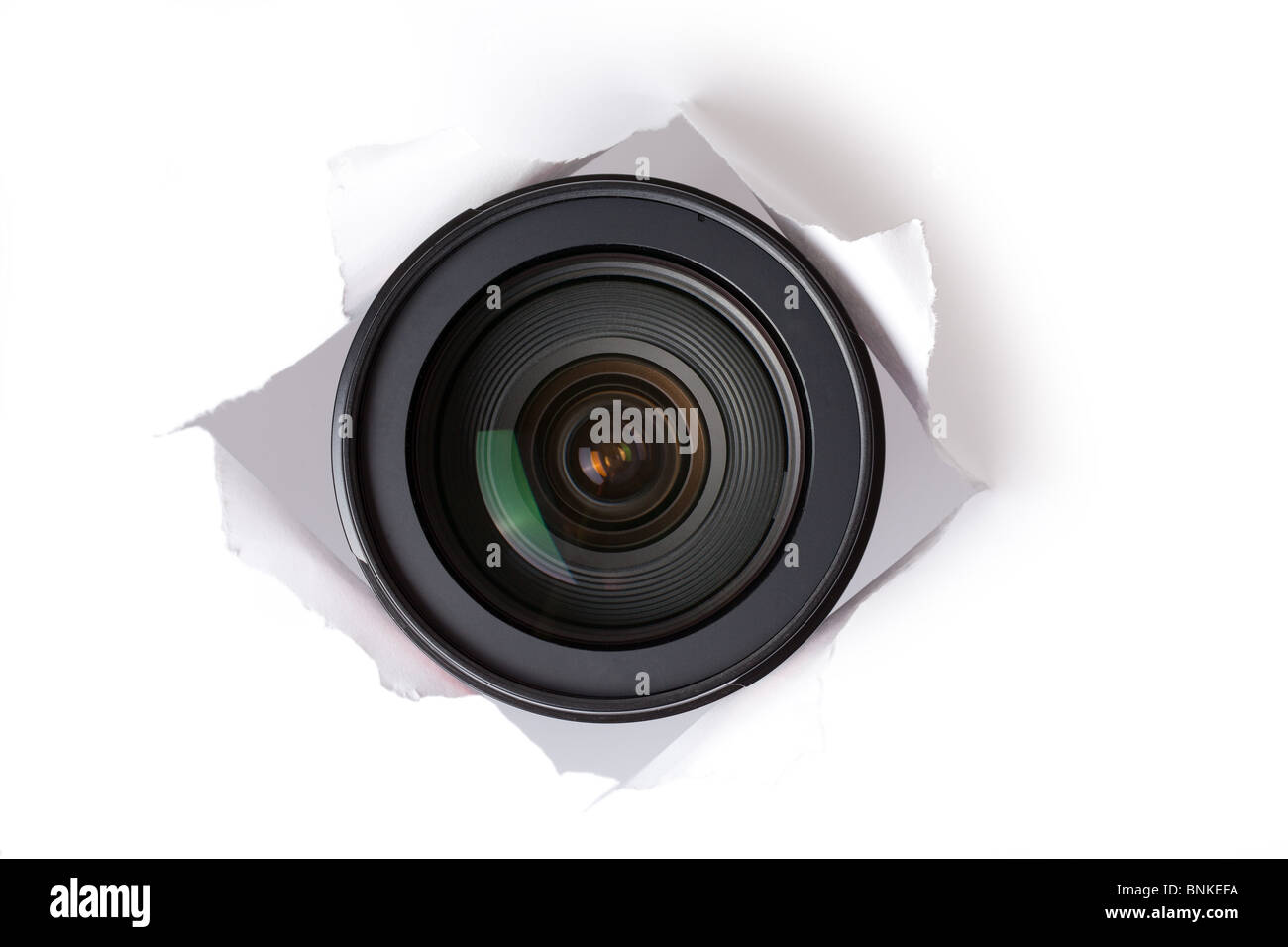 the camera lens in hole Stock Photo