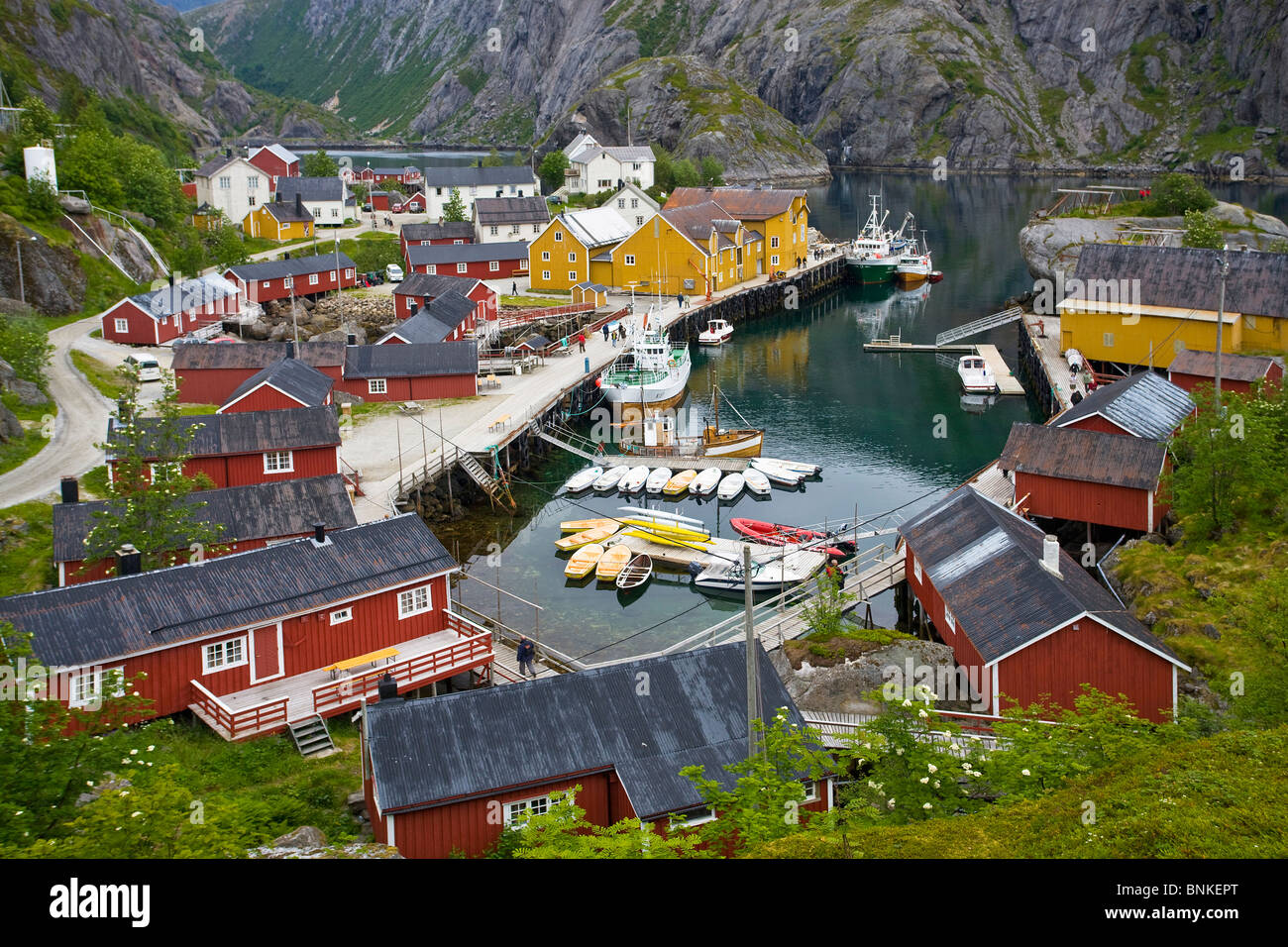 Norway Scandinavia the north northern Norway Lofoten islands isles Nusfjord houses  homes harbour port mountains travel holidays Stock Photo - Alamy