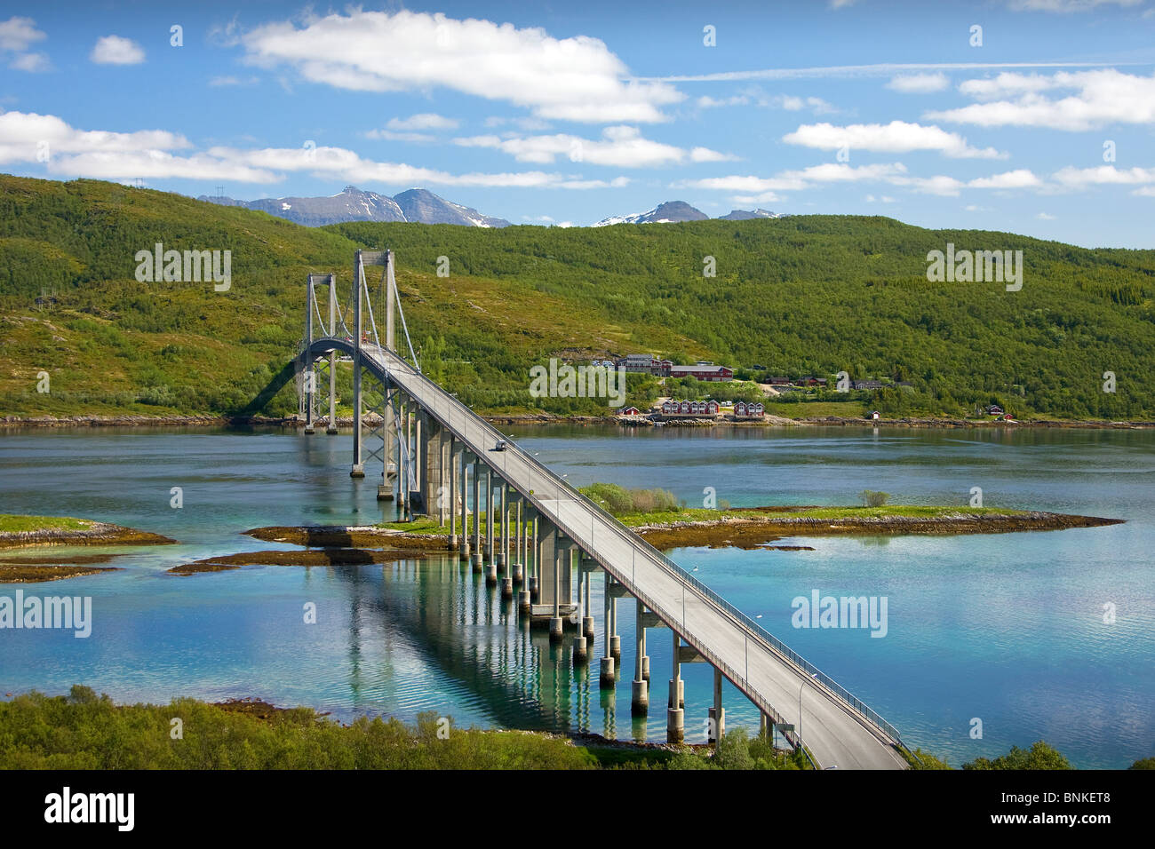 Norway Scandinavia Tjelsund bridge river flow near Narvik town city suspension bridge water travel travel holidays vacation Stock Photo