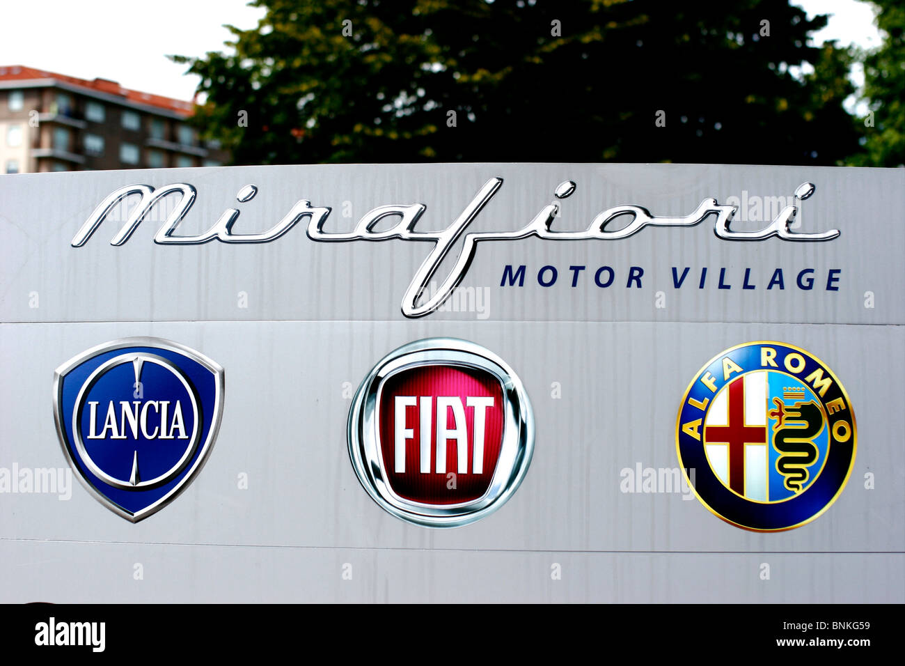 Mirafiori Motor Village. Fiat, Lancia and Alfa Romeo logos in Turin. Stock Photo